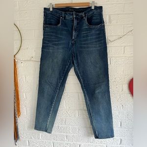 Universal standard gently worn straight leg, stretchy medium to dark wash jeans